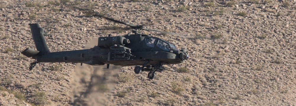AH-6E Apache helicopter provides security