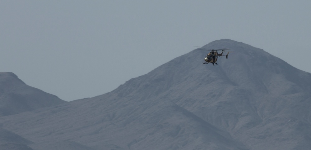 Enemy helicopter moves to attack Soldiers