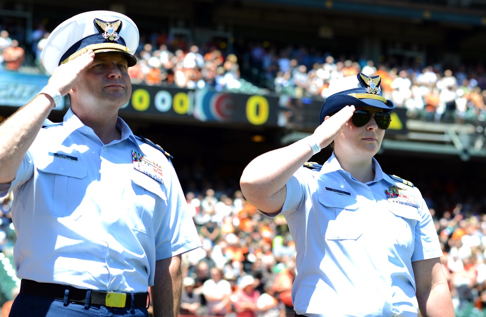 Coast Guard officers render salute at AT&amp;T Park on Memorial Day