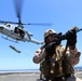 Force Reconnaissance Detachment fast ropes onto the USS San Diego