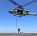 Force Reconnaissance Detachment fast ropes onto the USS San Diego