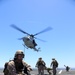 Force Reconnaissance Detachment fast ropes onto the USS San Diego