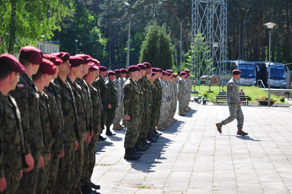 Paratroopers from three nations exchange wings in Poland