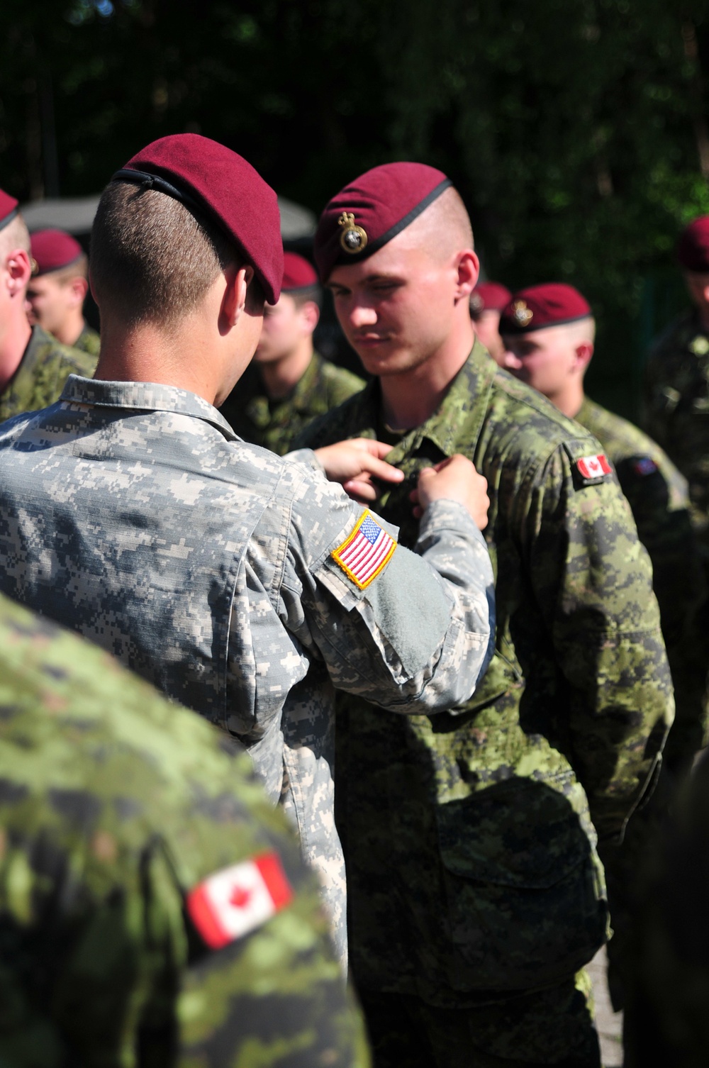 Paratroopers from three nations exchange wings in Poland