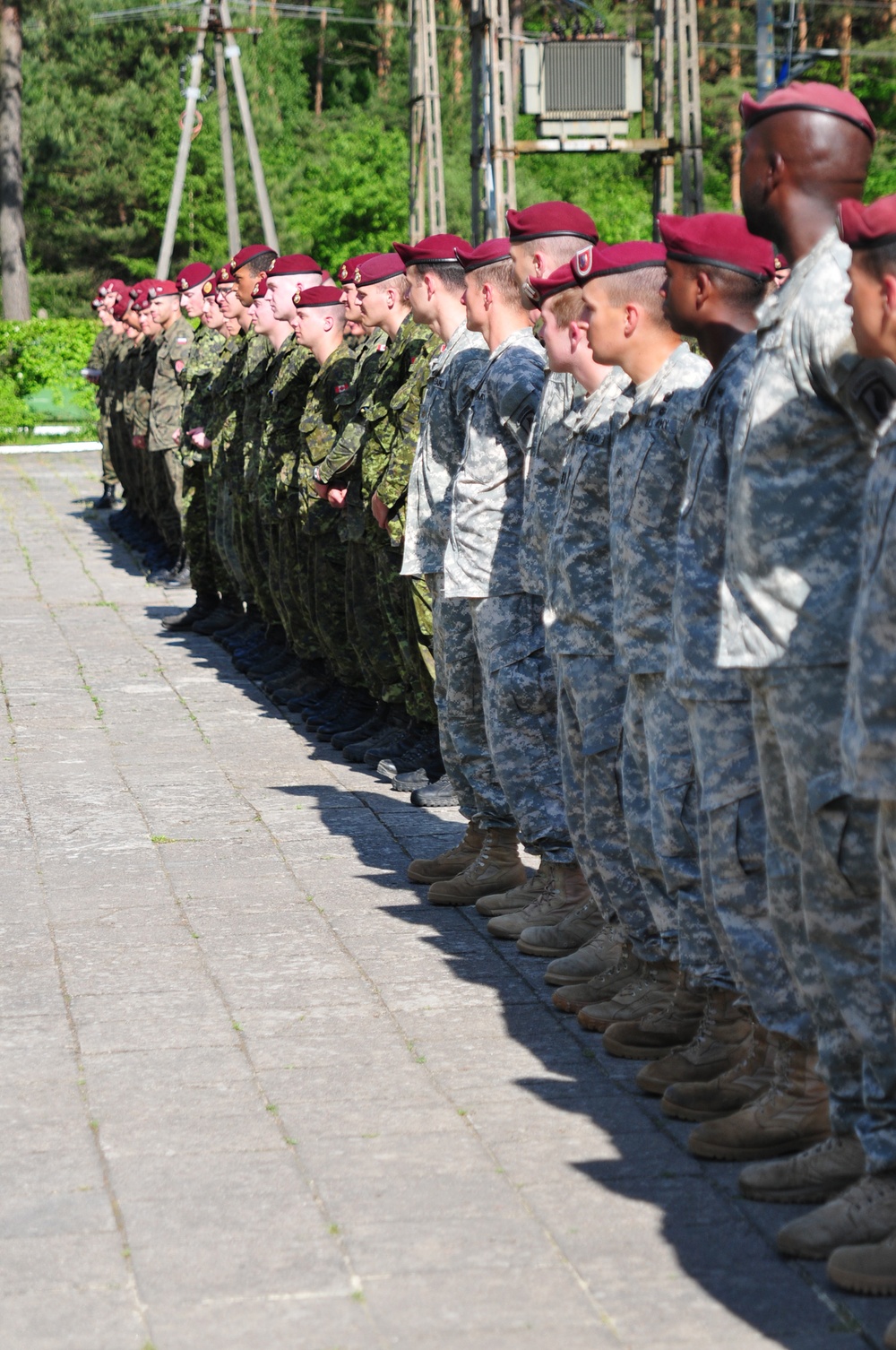 Paratroopers from three nations exchange wings in Poland