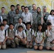 Teach thy neighbor: Middle school students learn English from Soldiers