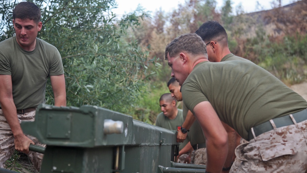 Combat engineers build bridge over muddy water for World Famous Mud Run