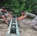 Combat engineers build bridge over muddy water for World Famous Mud Run