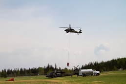 Alaska Army National Guard Black Hawks help fight wildfire