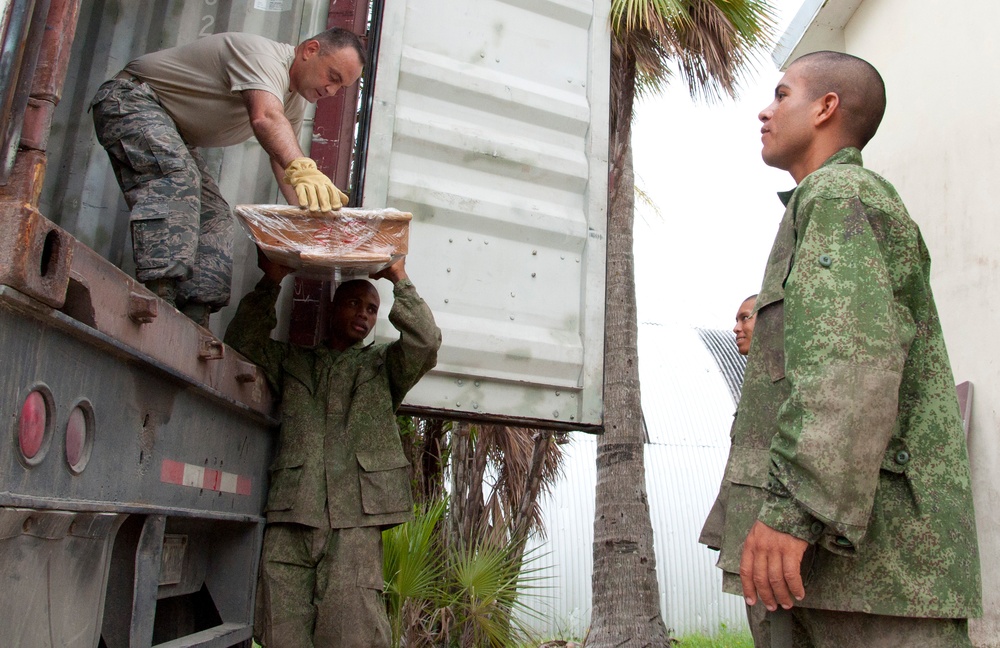 MMDC donates school supplies, furniture to Belize schools