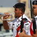 Jordanian honor guard bugler sounds attention at Eager Lion 2014