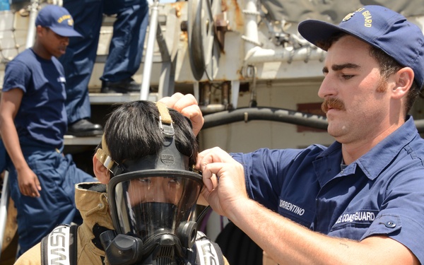Local student dons firefighting gear aboard Coast Guard Cutter Rush