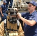 Local student dons firefighting gear aboard Coast Guard Cutter Rush