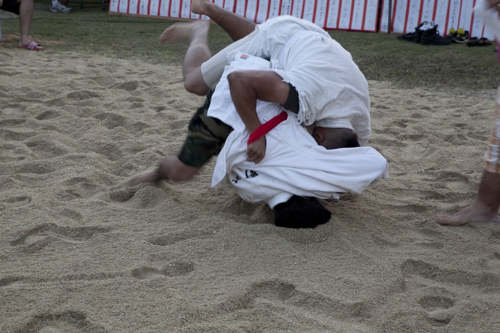 Culture, camaraderie, competition shared in Okinawa sumo tournament