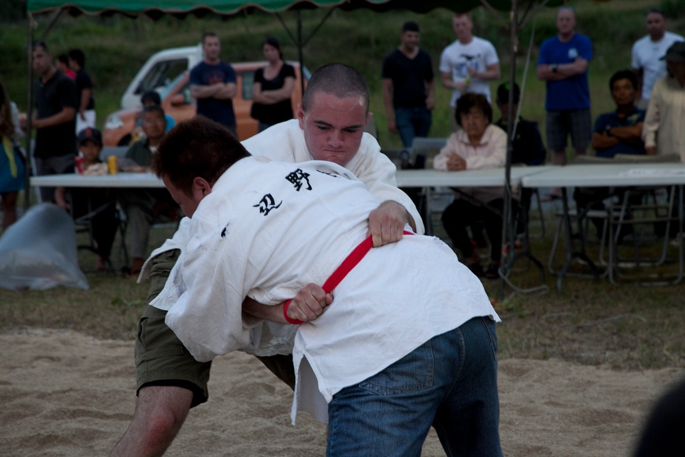 Culture, camaraderie, competition shared in Okinawa sumo tournament