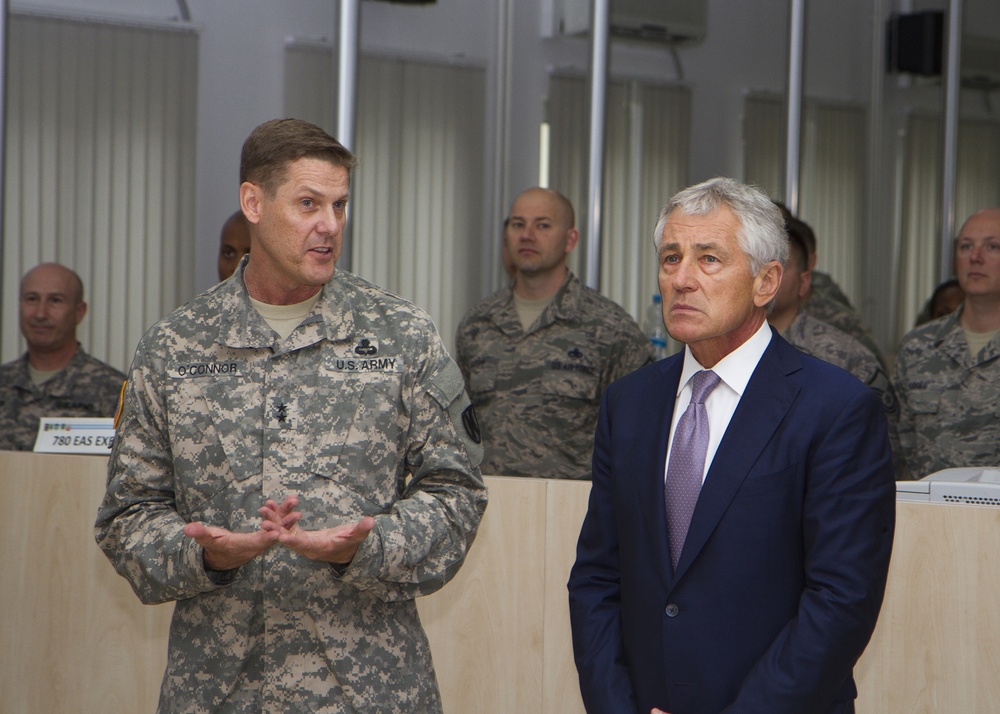 Maj. Gen. John O'Connor, commanding general of US Army Europe’s 21st Theater Sustainment Command, briefs US Secretary of Defense Chuck Hagel