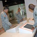 USAG Okinawa civilians and Soldiers take tour to disaster readiness center in Okinawa