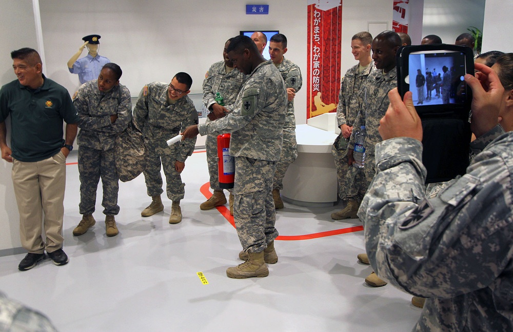 USAG Okinawa civilians and Soldiers take tour to disaster readiness center in Okinawa