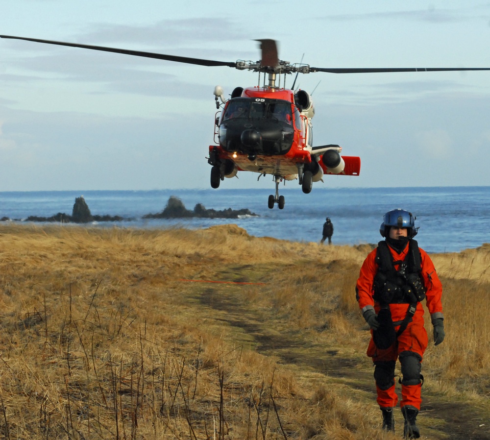 Coast Guard MH-60 Jayhawk helicopter crew prepares for vertical surface training in Kodiak, Alaska