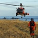 Coast Guard MH-60 Jayhawk helicopter crew prepares for vertical surface training in Kodiak, Alaska