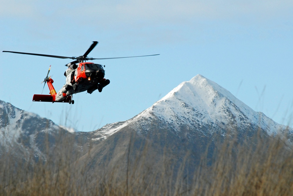 Coast Guard MH-60 Jayhawk helicopter crew arrives at Spruce Cape near Kodiak, Alaska