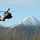 Coast Guard MH-60 Jayhawk helicopter crew arrives at Spruce Cape near Kodiak, Alaska