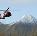 Coast Guard MH-60 Jayhawk helicopter crew arrives at Spruce Cape near Kodiak, Alaska