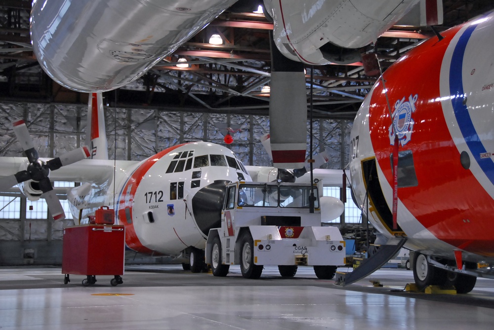 Coast Guard HC-130 Hercules aircraft stand ready for deployment in Kodiak, Alaska