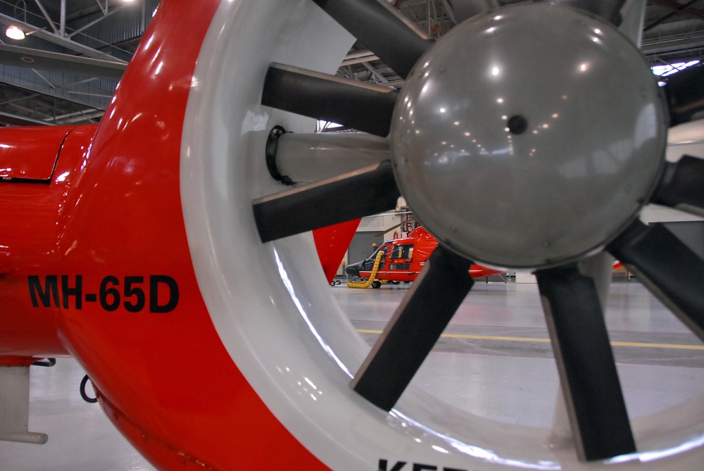 Coast Guard MH-65 Dolphin helicopters stand ready for deployment in Kodiak, Alaska