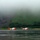 Coast Guard MH-60 Jayhawk helicopters stand ready for deployment on the flight line in Kodiak, Alaska