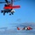 Coast Guard MH-60 Jayhawk helicopter crew conducts vertical surface training hoist operation in Kodiak, Alaska