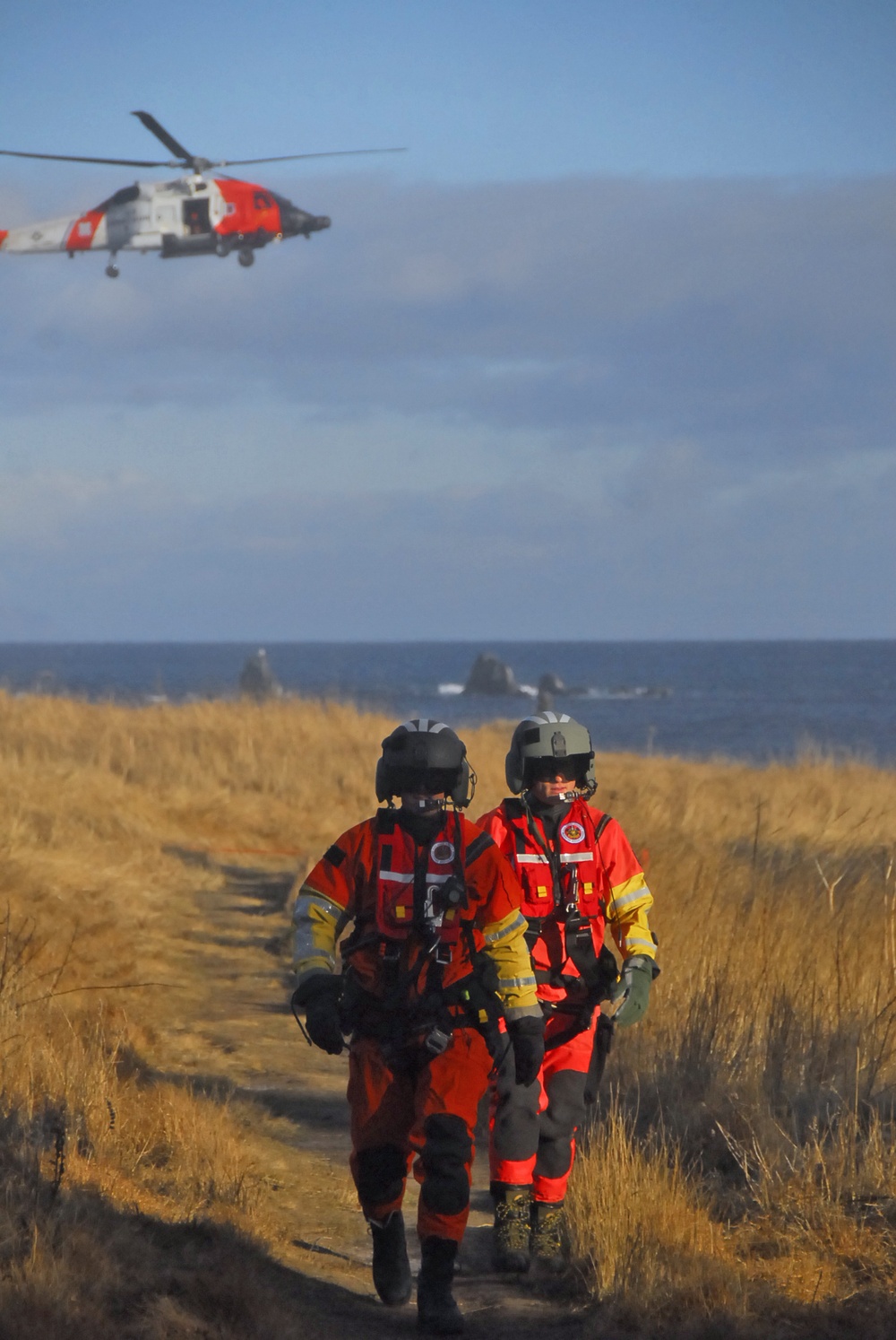 Coast Guard aviation survival technicians prepare for vertical surface training in Kodiak, Alaska