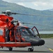 Coast Guard MH-65 Dolphin helicopter crew prepares for takeoff at Air Station Kodiak, Alaska