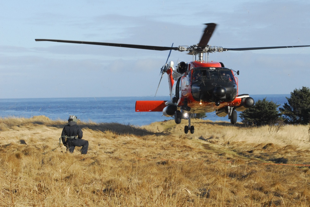 Coast Guard MH-60 Jayhawk helicopter crew conducts vertical surface training in Kodiak, Alaska