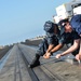 USS Ronald Reagan sailors tighten bolts
