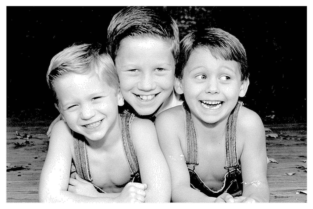 Kyle Carpenter with his younger twin brothers, Peyton and Price.
