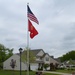 Retired Marine Sgt. Shurvon Phillip and his family received a new flagpole and flags.
