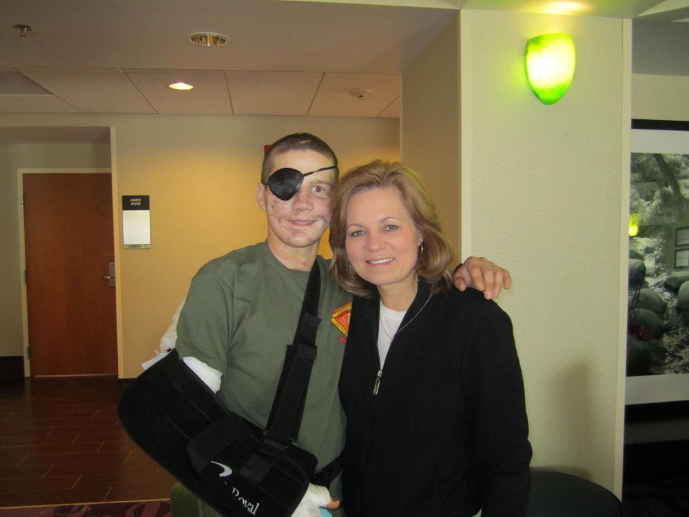 Cpl. Kyle Carpenter with his mother, Robin