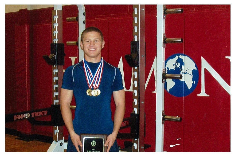 Kyle Carpenter poses for a high school photo at W. Wyman King Academy