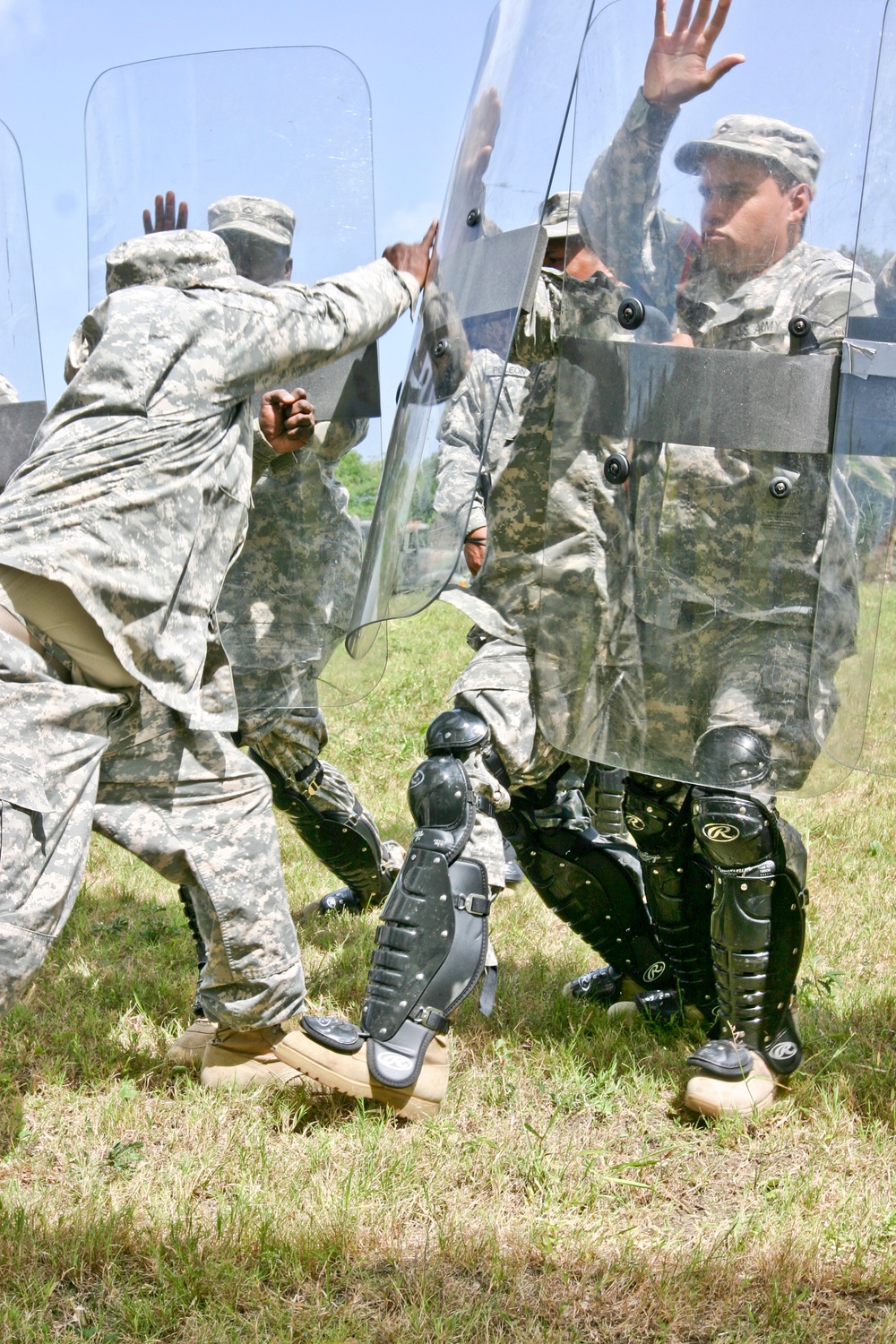 Sgt. Maj. Miller endures the ongoing spray of water during Operation Forward Guardian II