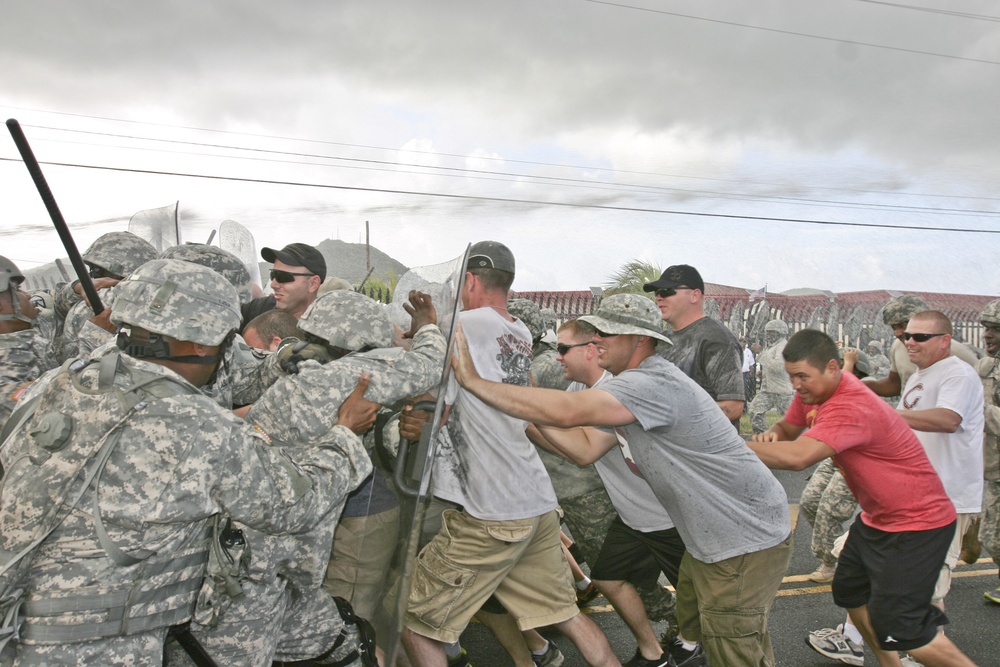 3rd Battalion, 411th Regiment (Logistical Support Battalion) participate in  riot control simulation during Operation Forward Guardinan II.