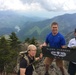 Bilateral hiking team rescue severely injured hiker