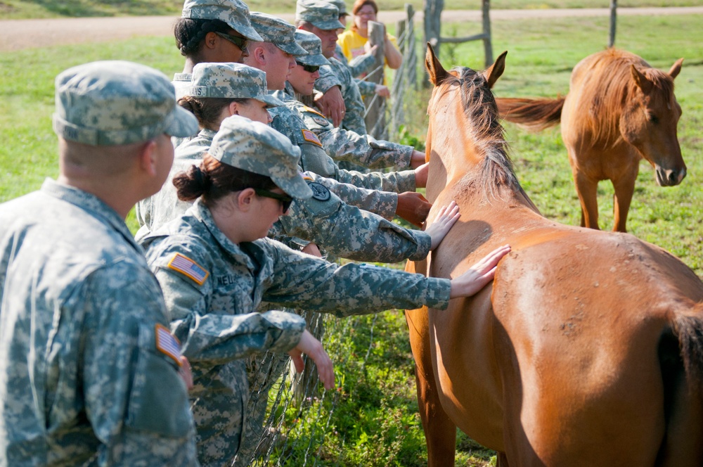 III Corps Soldiers make new friends near the Parie Haynes Ranch