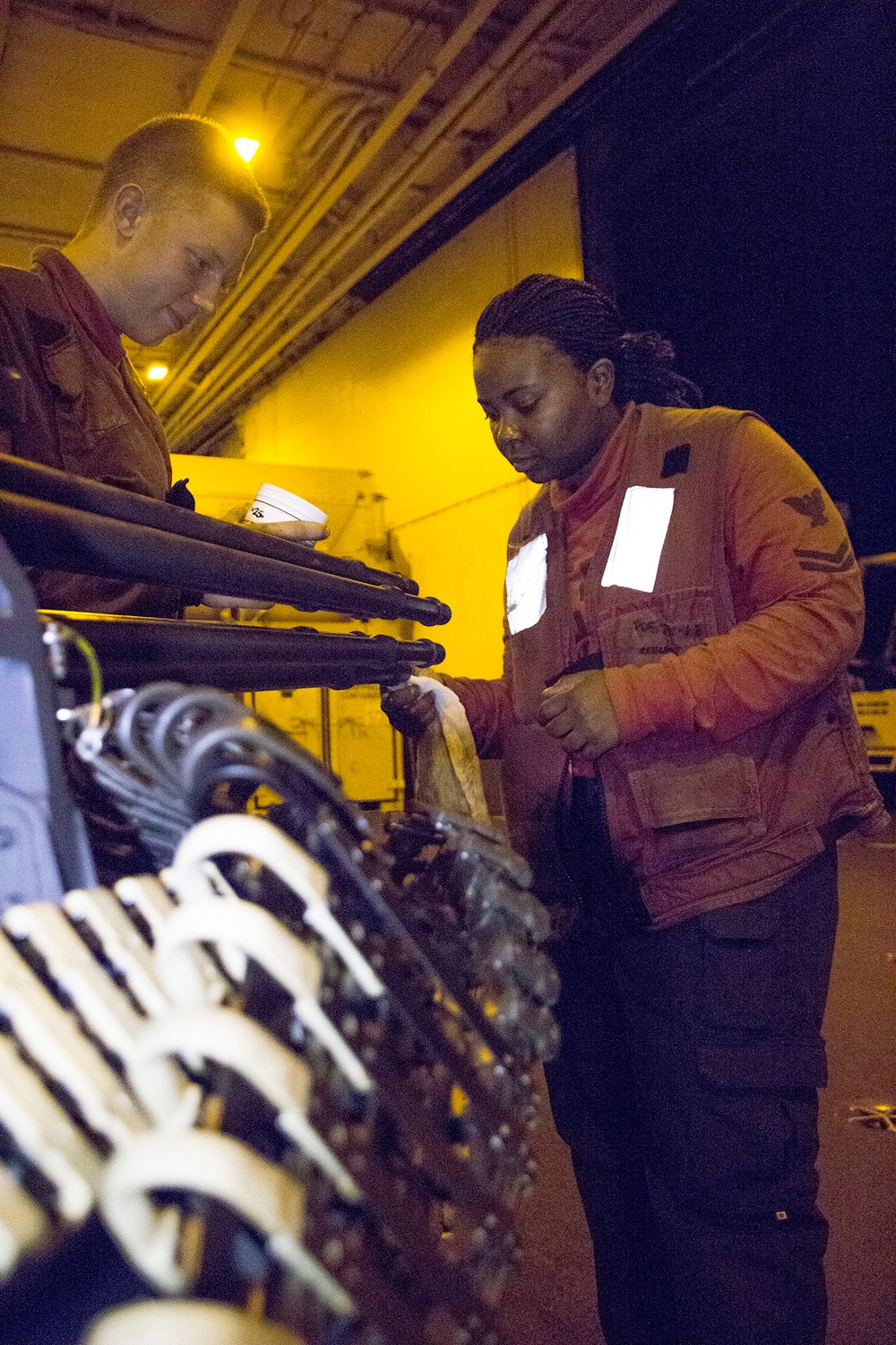 F/A-18E Super Hornet chain gun cleaning aboard USS George Washington