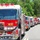 A large procession of fire trucks