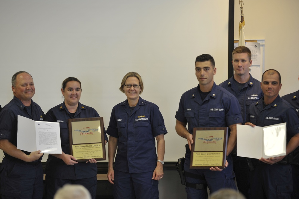 Admiral Fagan presents Coast Guard Station and Auxiliary Flotilla with the Boat Responsibly Award