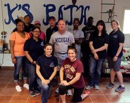 108th Sustainment Brigade Soldiers volunteer at Kuwait Animal Shelter