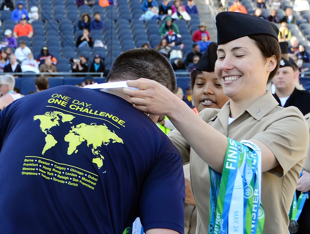 FHCC Sailors present finishing medals at Soldier Field 10 Mile