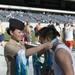 FHCC Sailors present finishing medals at Soldier Field 10 Mile