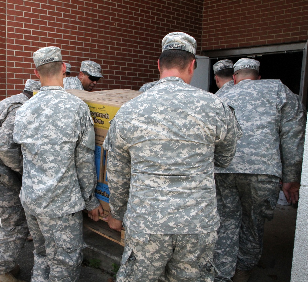 ‘Hugs for Soldiers’ deliver Girl Scout cookies to Soldiers